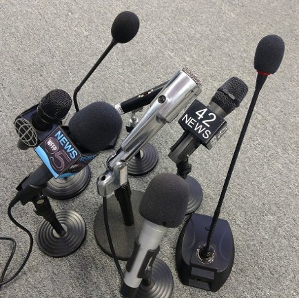 press conference  microphone groups